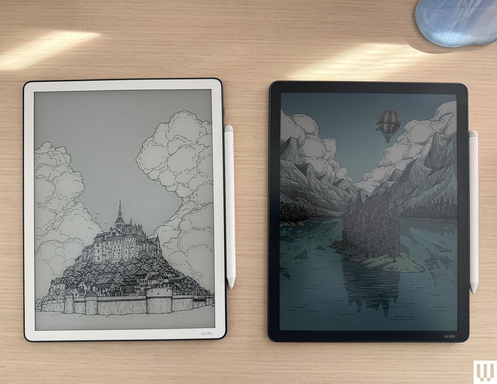 Kindle Scribe Colorsoft and Kindle Scribe side by side two digital tablets with attached stylus